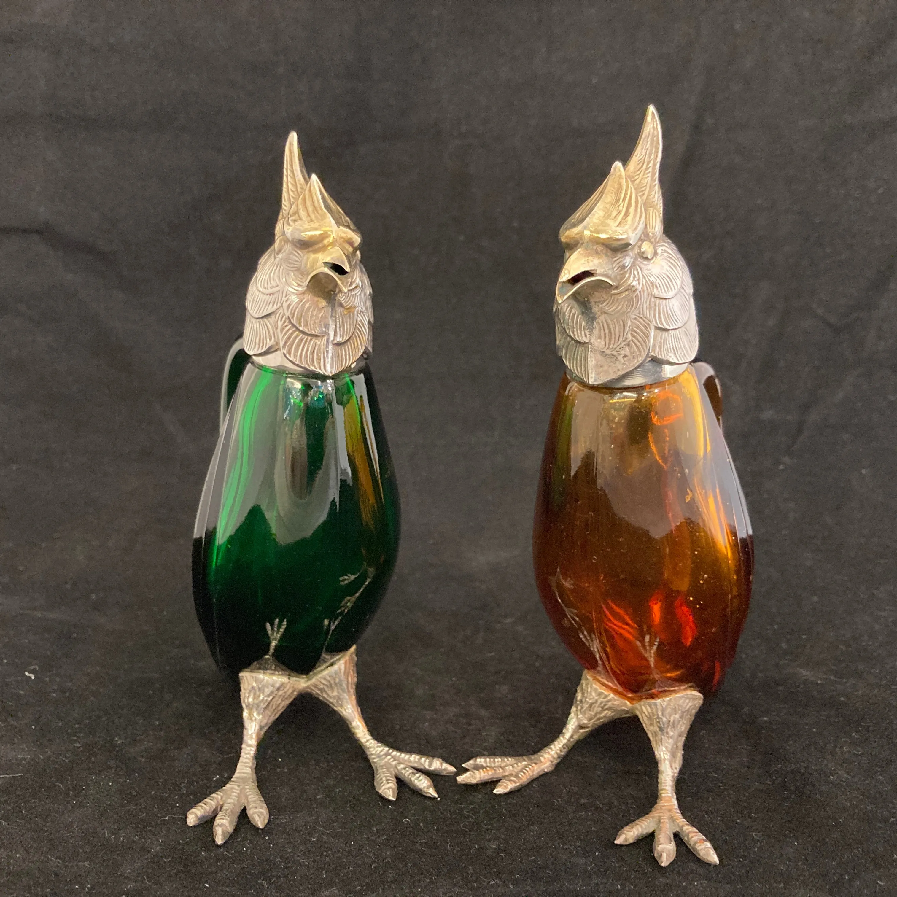 Pair of silver Whiskey noggins in the shape of cockatoos parrots