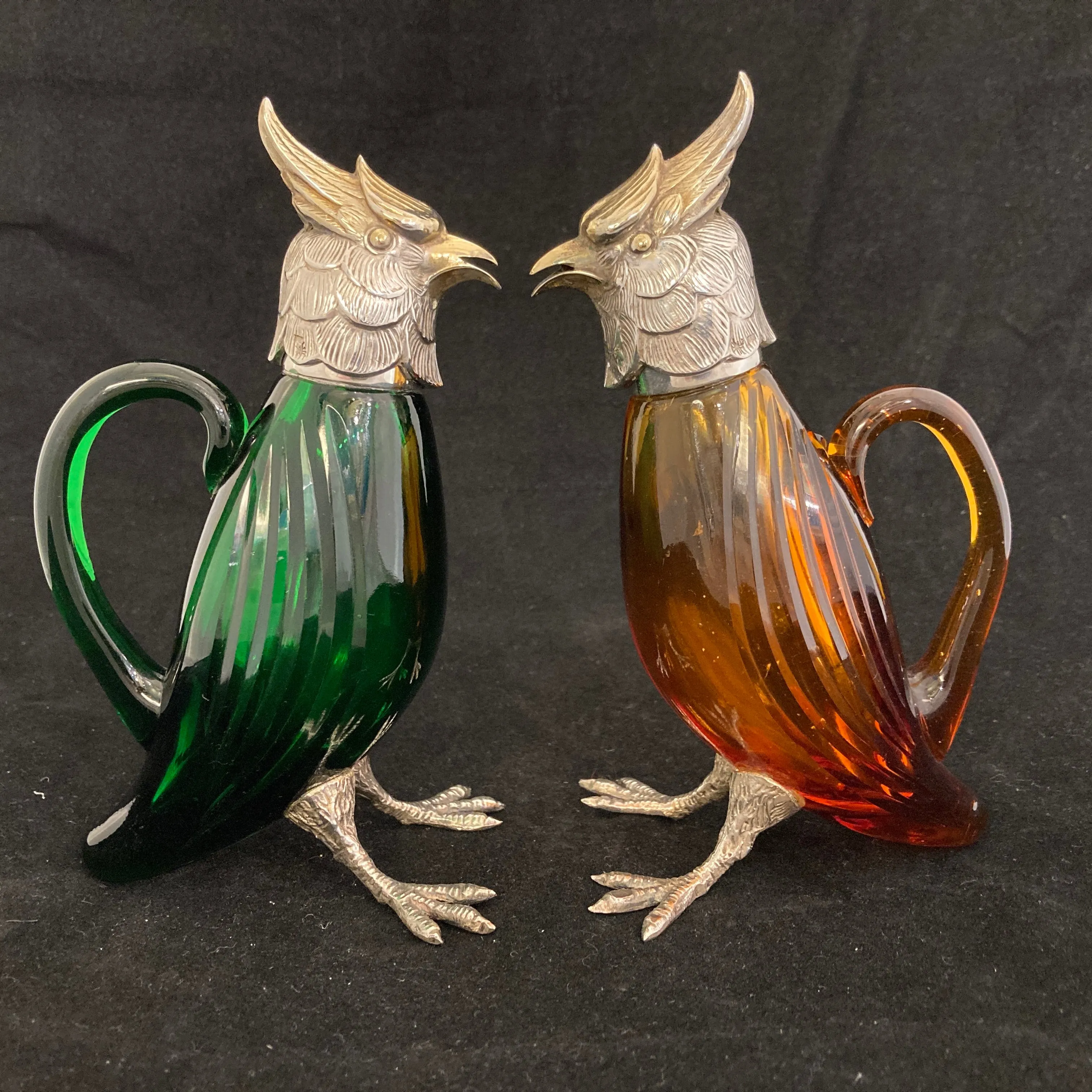 Pair of silver Whiskey noggins in the shape of cockatoos parrots