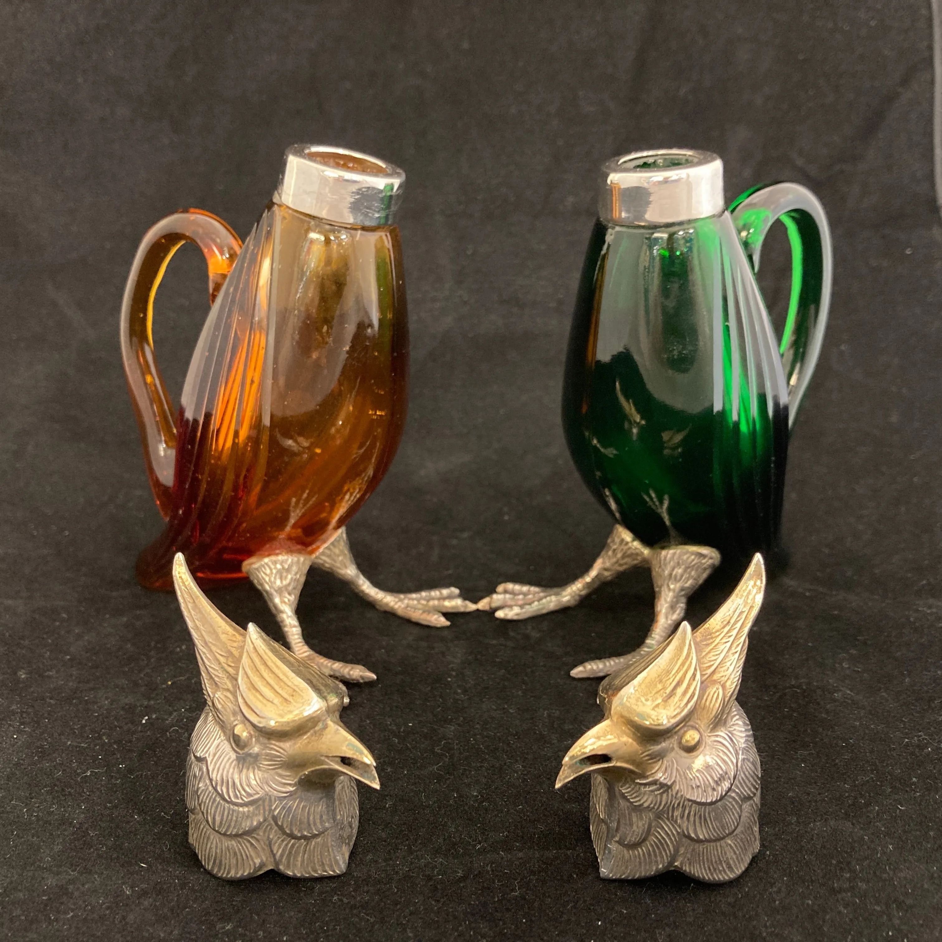 Pair of silver Whiskey noggins in the shape of cockatoos parrots